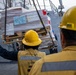 USS Mustin conducts a replenishment-at-sea with USNS Carl Brashear