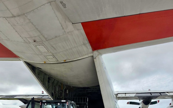 U.S. Coast Guard crew delivers assessment team, water to Rota for port recovery from Super Typhoon Bavi