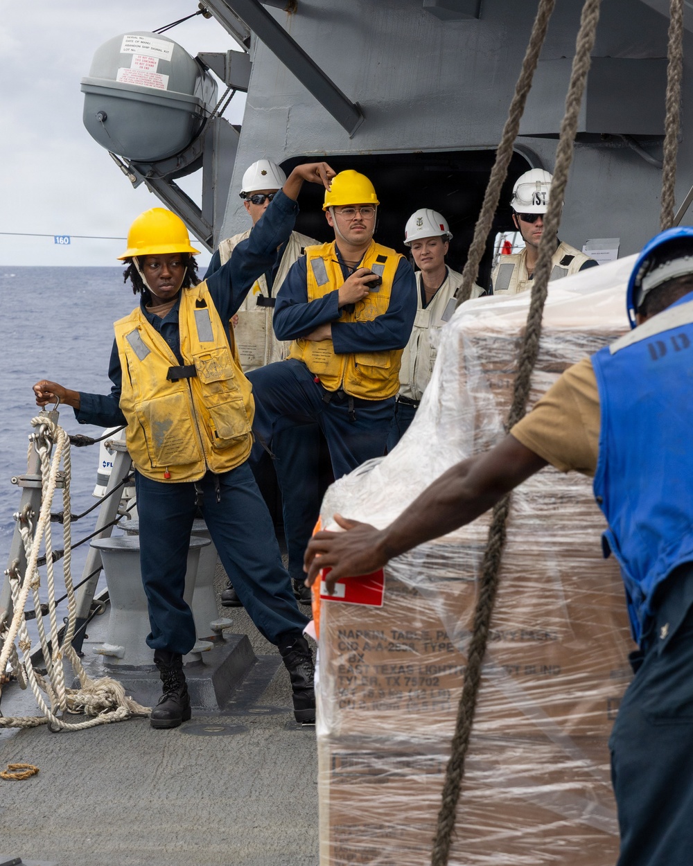 USS Mustin conducts a replenishment-at-sea with USNS Carl Brashear