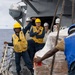 USS Mustin conducts a replenishment-at-sea with USNS Carl Brashear