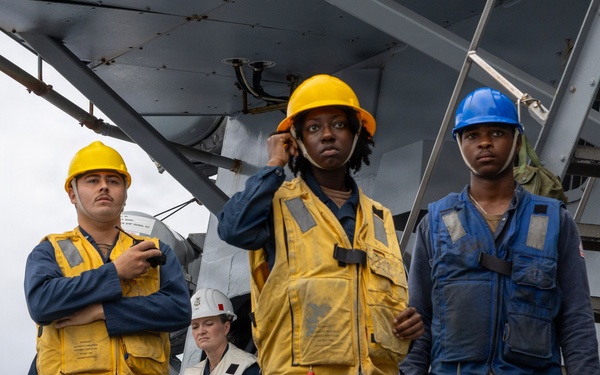 USS Mustin conducts a replenishment-at-sea with USNS Carl Brashear