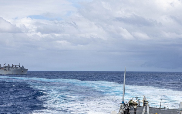 USS Mustin conducts a replenishment-at-sea with USNS Carl Brashear