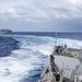 USS Mustin conducts a replenishment-at-sea with USNS Carl Brashear