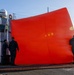USS Mustin conducts a “killer tomato” inflatable surface target live-fire exercise