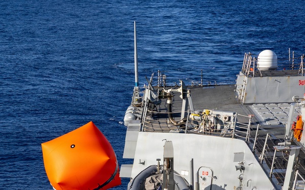 USS Mustin conducts a “killer tomato” inflatable surface target live-fire exercise