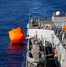 USS Mustin conducts a “killer tomato” inflatable surface target live-fire exercise