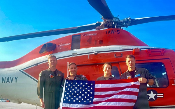 Naval Flight Officers assigned to Training Air Wing (TW) 6 located at Naval Air Station (NAS) Pensacola and Naval Aviators assigned to TW-5 located at NAS Whiting Field, participate in a flyover of the Symphony Sparks &amp; Stars, July 4