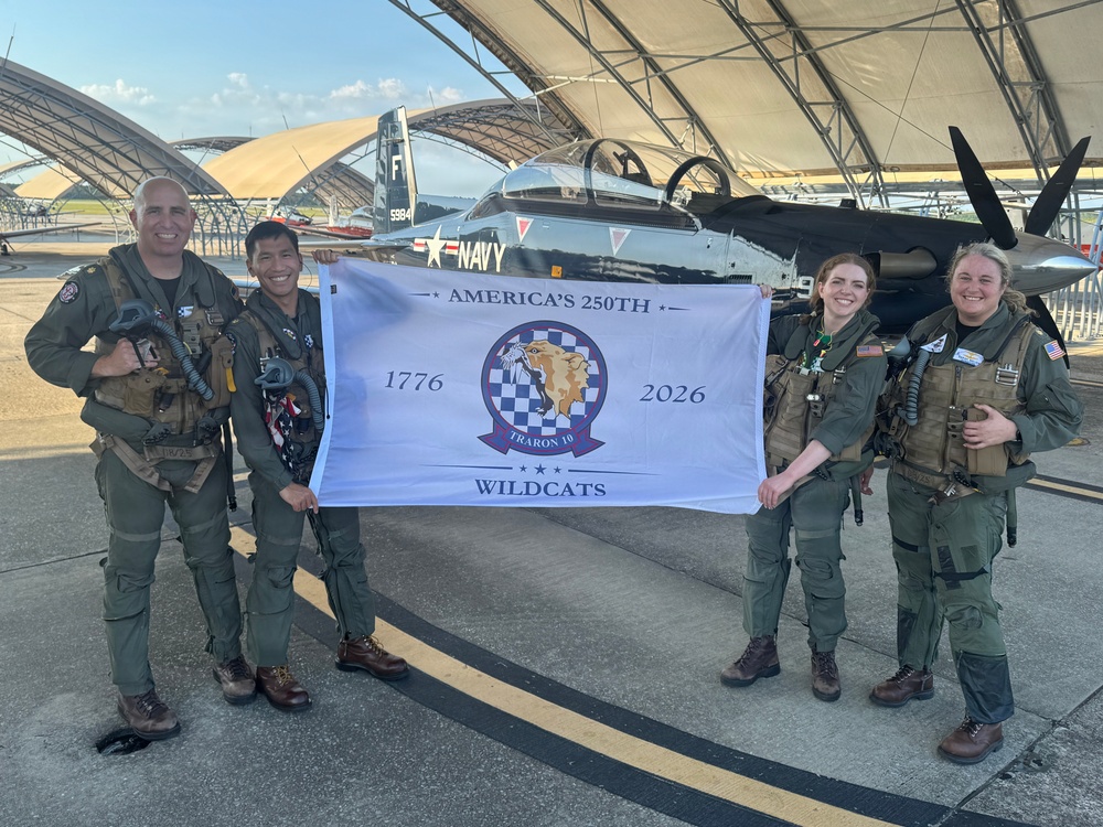 Naval Flight Officers assigned to Training Air Wing (TW) 6 located at Naval Air Station (NAS) Pensacola and Naval Aviators assigned to TW-5 located at NAS Whiting Field, participate in a flyover of the Symphony Sparks &amp; Stars, July 4