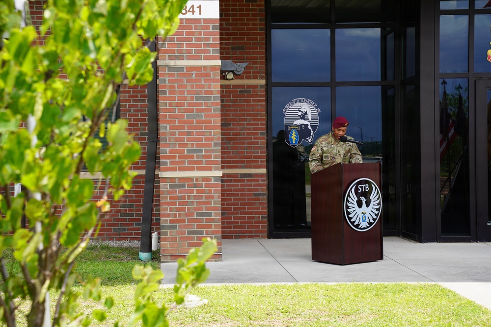 Help me with captions. Good ways to say "Salute the flag during the national anthem in a change of command ceremony)