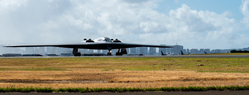 Two B-2 Spirits hot-pit at Joint Base Pearl Harbor-Hickam during BTF deployment