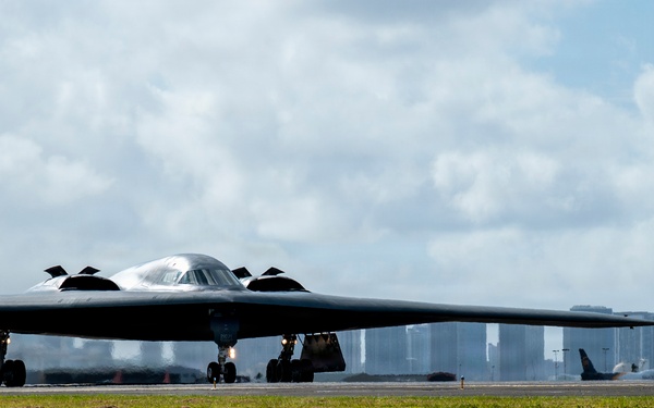 Two B-2 Spirits hot-pit at Joint Base Pearl Harbor-Hickam during BTF deployment