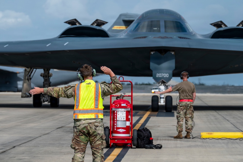 Two B-2 Spirits hot-pit at Joint Base Pearl Harbor-Hickam during BTF deployment