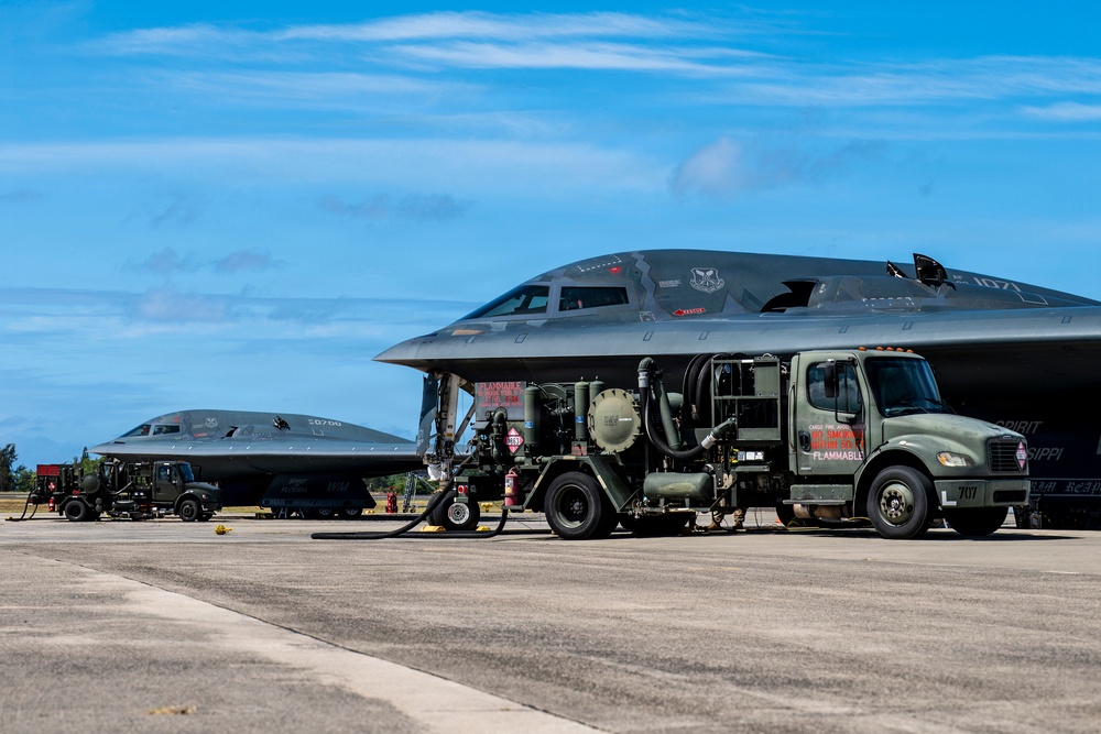 Two B-2 Spirits hot-pit at Joint Base Pearl Harbor-Hickam during BTF deployment