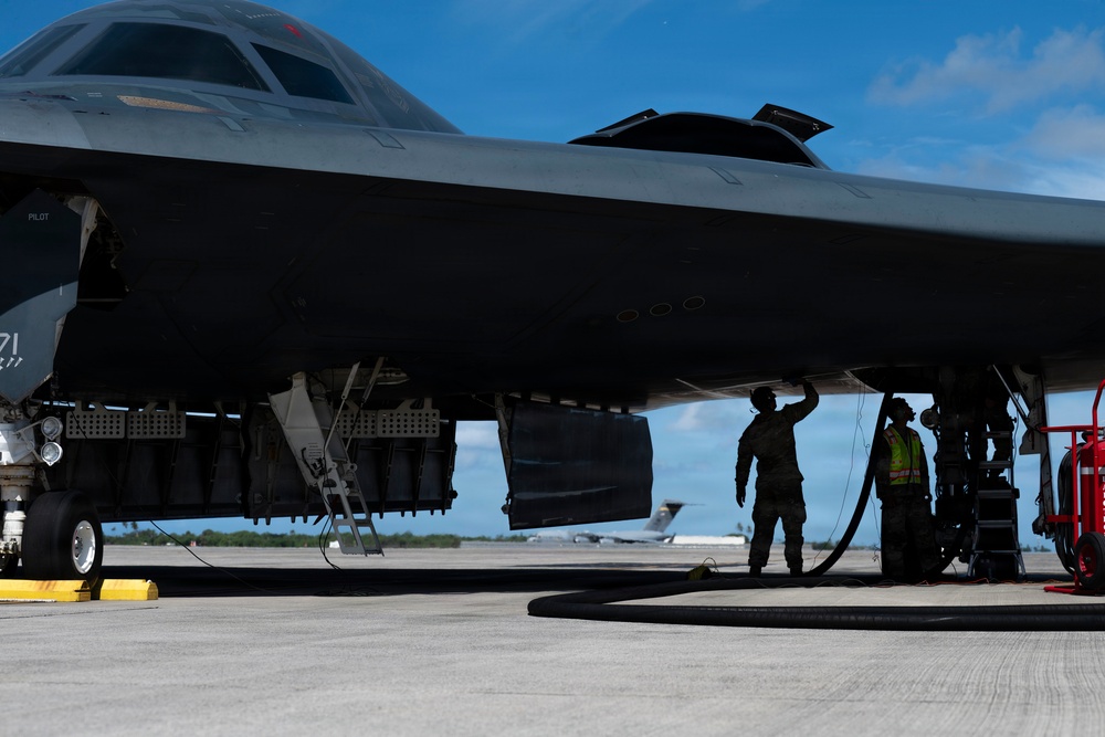Two B-2 Spirits hot-pit at Joint Base Pearl Harbor-Hickam during BTF deployment