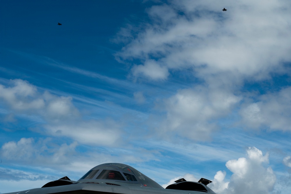 Two B-2 Spirits hot-pit at Joint Base Pearl Harbor-Hickam during BTF deployment