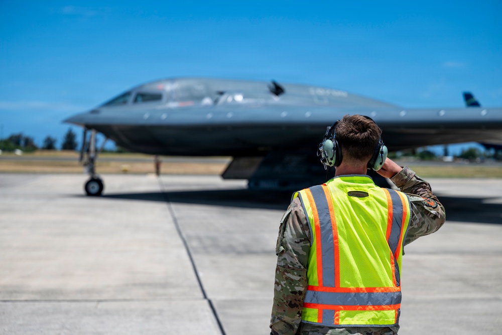 Two B-2 Spirits hot-pit at Joint Base Pearl Harbor-Hickam during BTF deployment