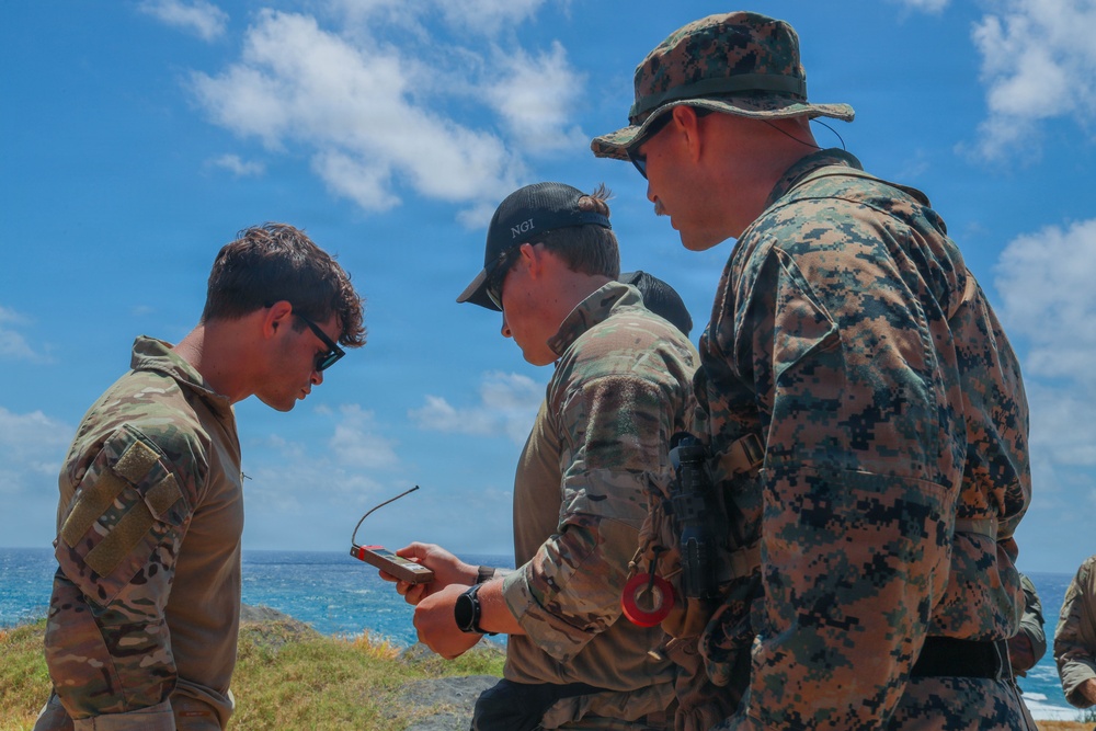 Multinational explosive ordnance disposal technicians conduct ordnance exploitation training during RIMPAC 2026