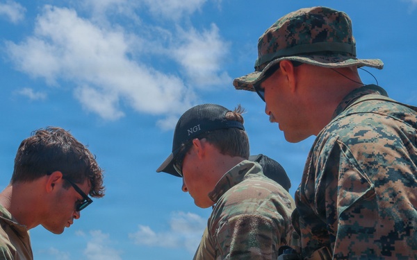 Multinational explosive ordnance disposal technicians conduct ordnance exploitation training during RIMPAC 2026