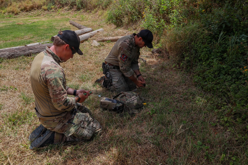 Multinational explosive ordnance disposal technicians conduct ordnance exploitation training during RIMPAC 2026