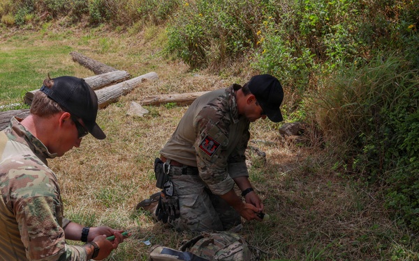Multinational explosive ordnance disposal technicians conduct ordnance exploitation training during RIMPAC 2026