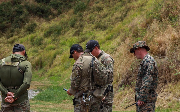 Multinational explosive ordnance disposal technicians conduct ordnance exploitation training during RIMPAC 26