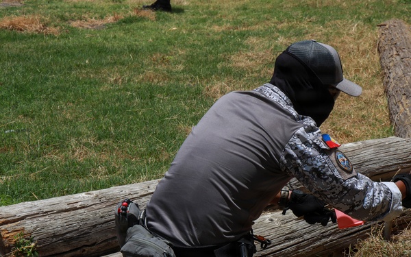 Multinational explosive ordnance disposal technicians conduct ordnance exploitation training during RIMPAC 2026