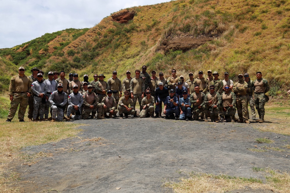 Multinational explosive ordnance disposal technicians conduct ordnance exploitation training during RIMPAC 2026
