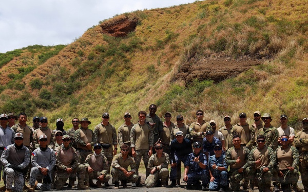 Multinational explosive ordnance disposal technicians conduct ordnance exploitation training during RIMPAC 2026