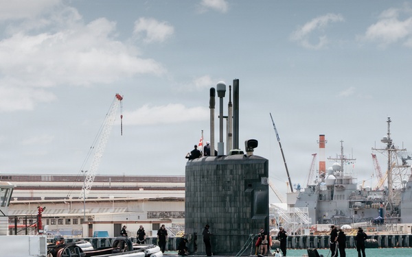 Royal Canadian Navy Victoria-class long-range patrol submarine HMCS Corner Brook (SSK 878) departs Pearl Harbor to begin RIMPAC 2026 sea phase