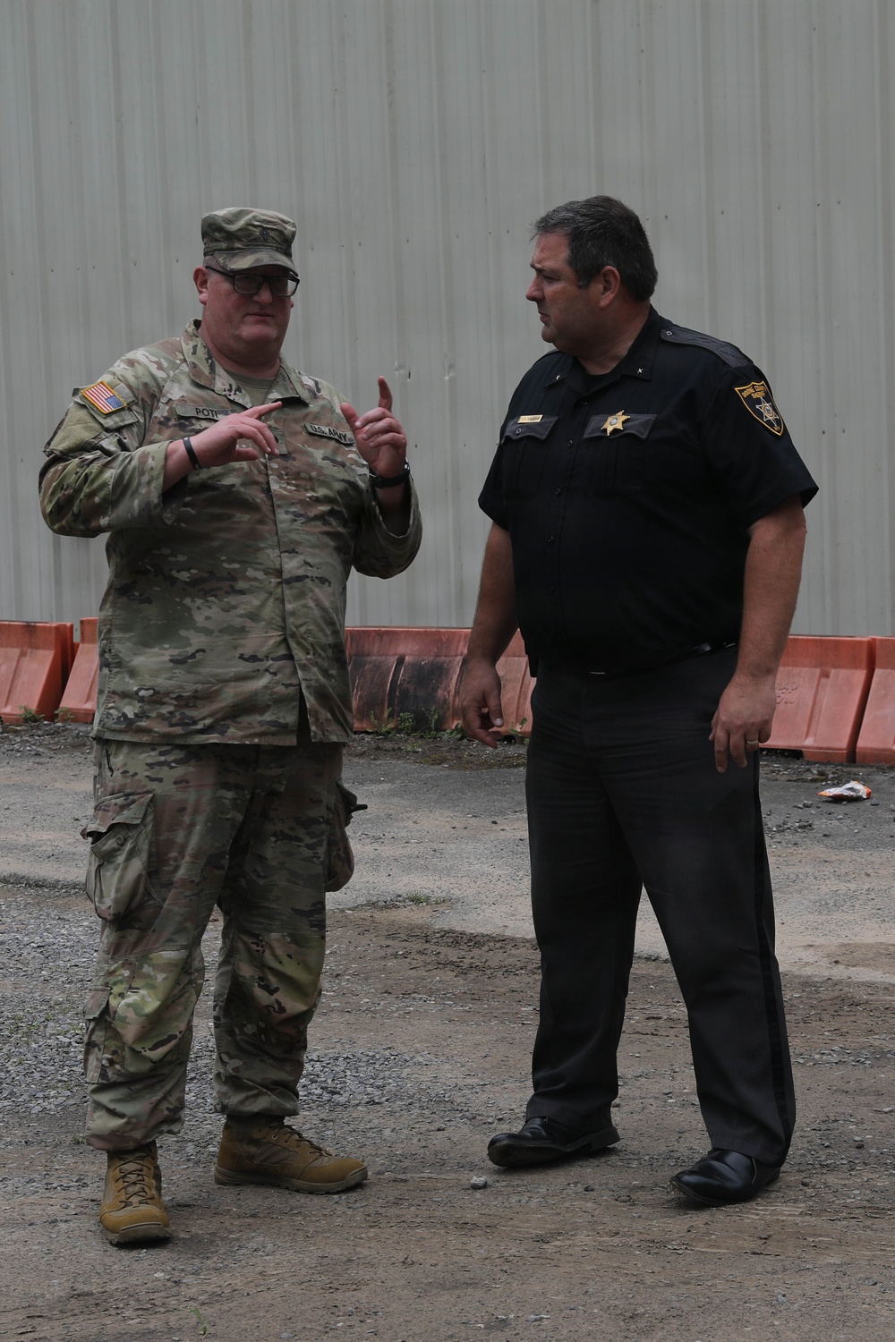 West Virginia Guardsmen clean up debris