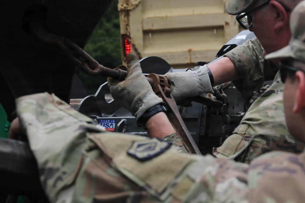 West Virginia Guardsmen clean up debris