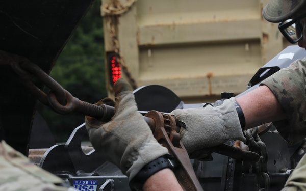 West Virginia Guardsmen clean up debris