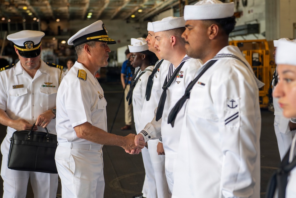 Rear Adm. Forrest Young Coins Sailors aboard USS Nimitz
