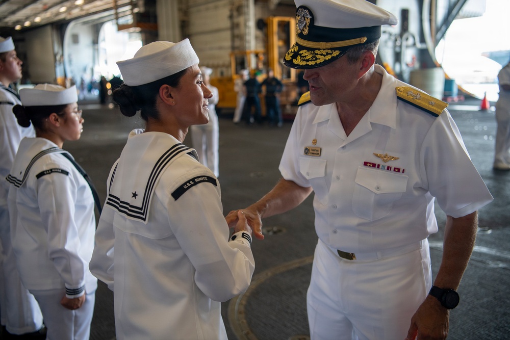 Rear Adm. Forrest Young Coins Sailors aboard USS Nimitz