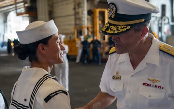 Rear Adm. Forrest Young Coins Sailors aboard USS Nimitz