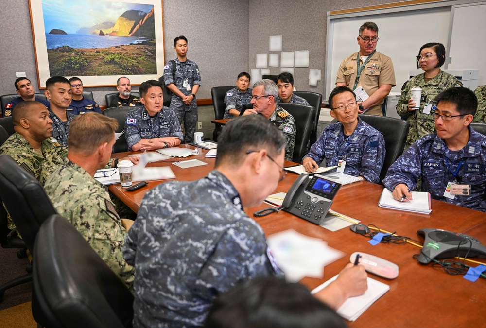 Multinational partners participate in the commander's update briefing RIMPAC 2026