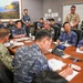 Multinational partners participate in the commander's update briefing RIMPAC 2026