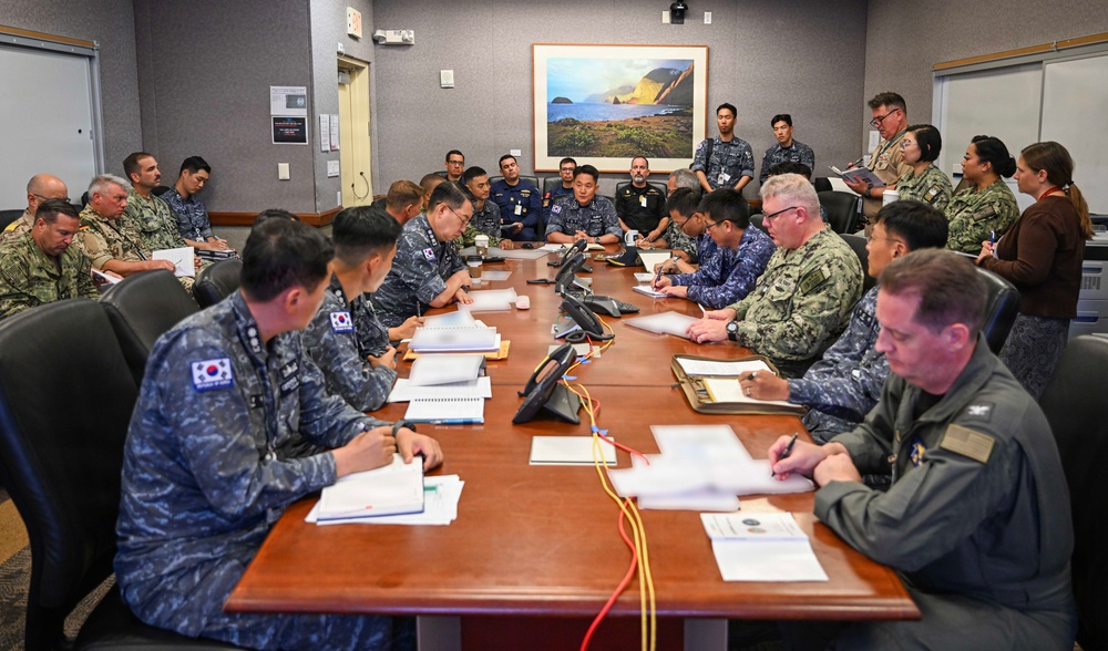 Multinational partners participate in the commander's update briefing RIMPAC 2026