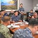 Multinational partners participate in the commander's update briefing RIMPAC 2026