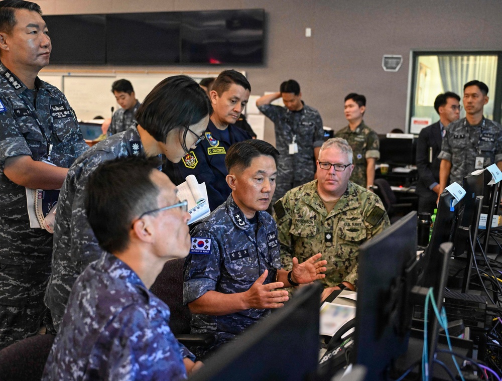 Multinational partners participate in the commander's update briefing RIMPAC 2026