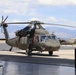 U.S. Army UH-60 Black Hawk helicopter on display during ceremony at mountain-region military airfield