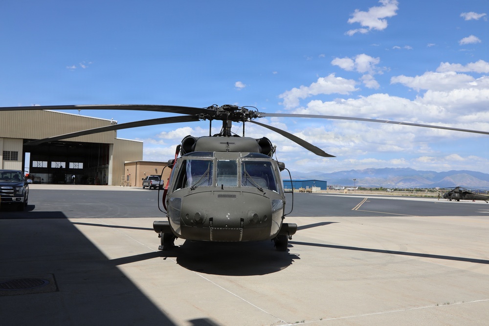 U.S. Army UH-60 Black Hawk helicopter sits on flight line at military installation
