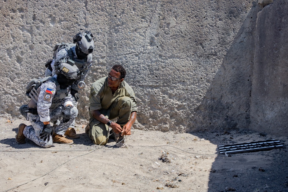 Multinational explosive ordnance disposal technicians train during RIMPAC 26