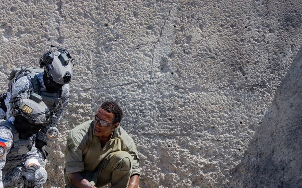Multinational explosive ordnance disposal technicians train during RIMPAC 26