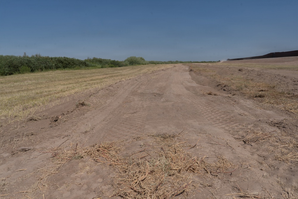Terrain clearing for HESCO barrier installation