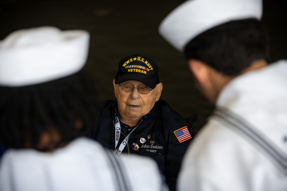 WWII Navy Veteran Tours USS Arlington for INR250