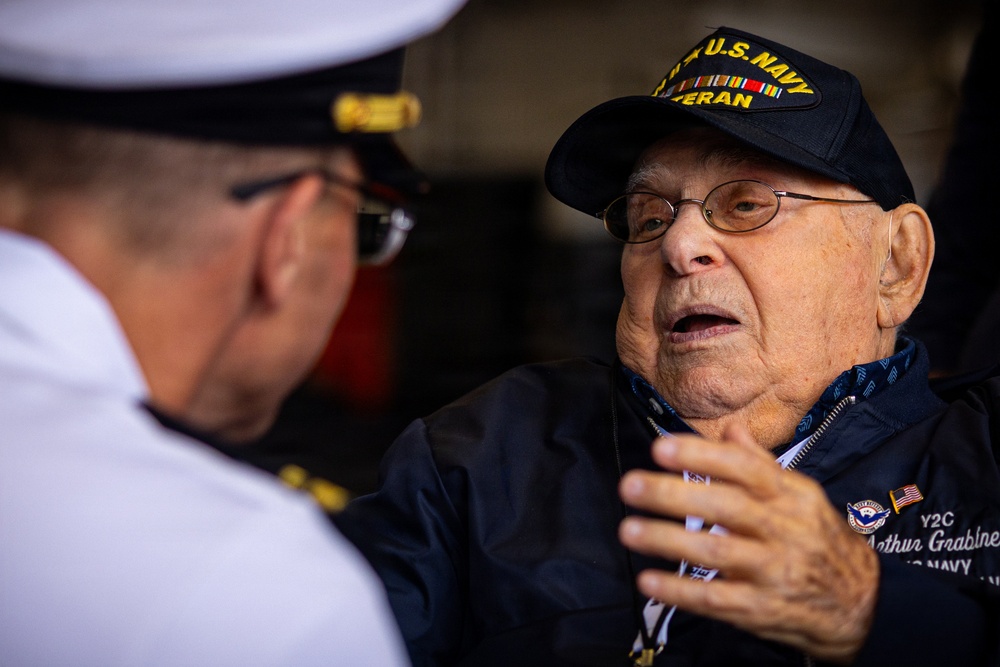 WWII Navy Veteran Tours USS Arlington for INR250