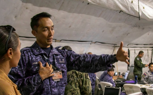 U.S. Marine Corps Maj. Serena Simeoli conducts a simulated media interview during RIMPAC 2026