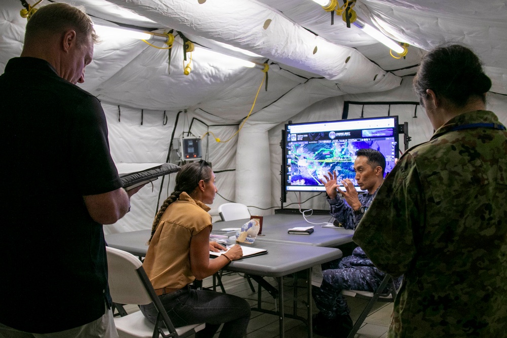 U.S. Marine Corps Maj. Serena Simeoli conducts a simulated media interview during RIMPAC 2026