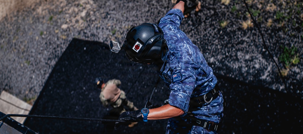 Multinational EOD technicians conduct HRST training during RIMPAC 26